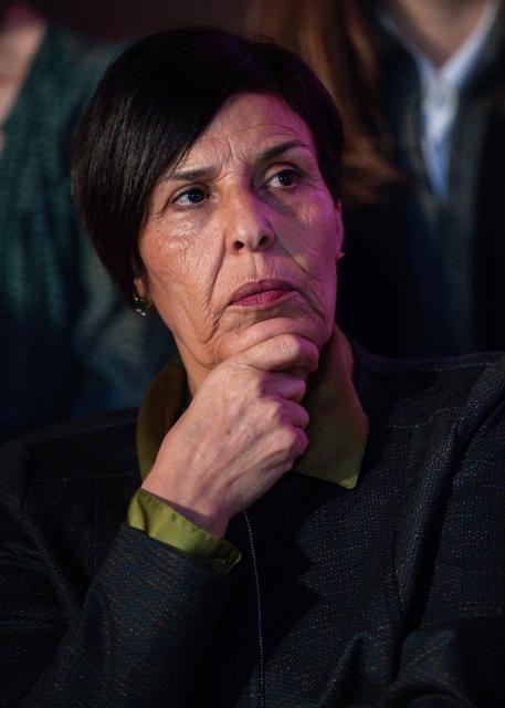 Member of the "Printemps Marseillais" and anti-racist activist Hanifa Taguelmint looks on during a press conference of Marseille's incumbent mayor and candidate for re-election, Benoit Payan (not pictured), in Marseille, southern France, on February 17, 2026. (Photo by MIGUEL MEDINA / AFP)