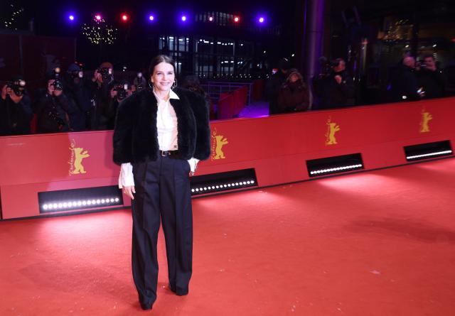 French actress Juliette Binoche poses on the red carpet for the film "Queen at Sea" presented in competition at the 76th Berlinale, Europe's first major film festival of the year, in Berlin on February 17, 2026. (Photo by Ronny HARTMANN / AFP)