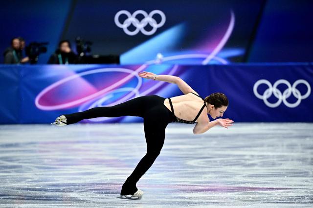 Britain's Kristen Spours competes in the figure skating women's single skating short program during the Milano Cortina 2026 Winter Olympic Games at Milano Ice Skating Arena in Milan on February 17, 2026. (Photo by JULIEN DE ROSA / AFP)