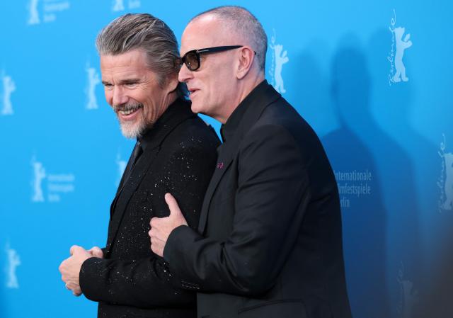 US actor Ethan Hawke (L) and US director Padraic McKinley pose during a photo call for the film 'The Weight' presented in Berlinale Special Gala at the 76th Berlinale, Europe's first major film festival of the year, in Berlin on February 17, 2026. (Photo by Ronny HARTMANN / AFP)