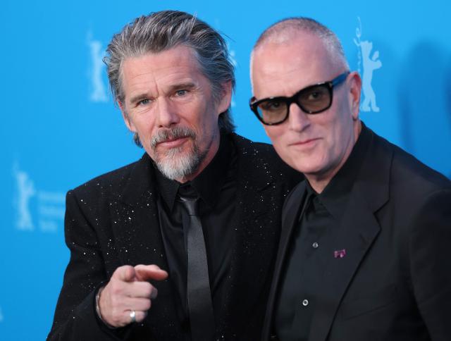 US actor Ethan Hawke (L) and US director Padraic McKinley pose during a photo call for the film 'The Weight' presented in Berlinale Special Gala at the 76th Berlinale, Europe's first major film festival of the year, in Berlin on February 17, 2026. (Photo by Ronny HARTMANN / AFP)