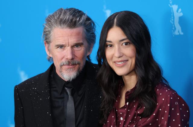 US actor Ethan Hawke and US actress Julia Jones pose during a photo call for the film 'The Weight' presented in Berlinale Special Gala at the 76th Berlinale, Europe's first major film festival of the year, in Berlin on February 17, 2026. (Photo by Ronny HARTMANN / AFP)