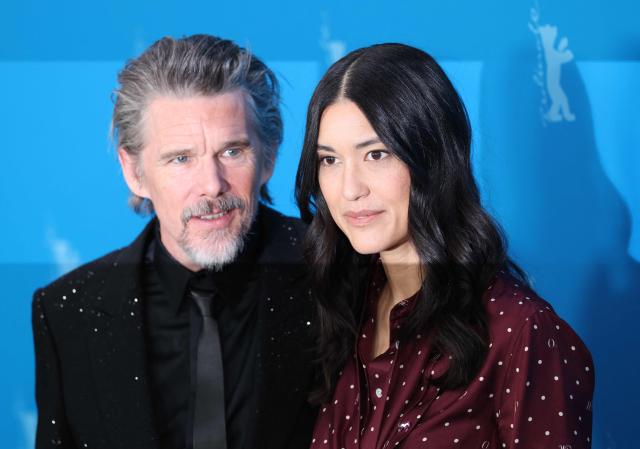 US actor Ethan Hawke and US actress Julia Jones pose during a photo call for the film 'The Weight' presented in Berlinale Special Gala at the 76th Berlinale, Europe's first major film festival of the year, in Berlin on February 17, 2026. (Photo by Ronny HARTMANN / AFP)