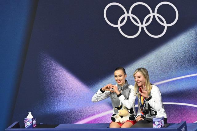 Switzerland's Livia Kaiser reacts in the kiss and cry area after competing in the figure skating women's single skating short program during the Milano Cortina 2026 Winter Olympic Games at Milano Ice Skating Arena in Milan on February 17, 2026. (Photo by Antonin THUILLIER / AFP)