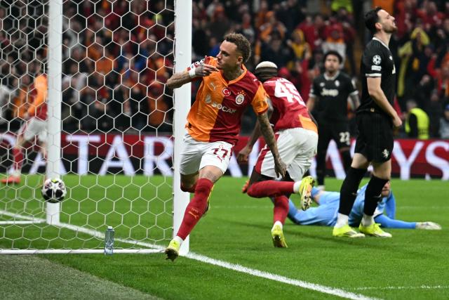 Galatasaray's Dutch forward #77 Noa Lang celebrates scoring his team's second goal during the UEFA Champions League, knockout round play-off 1st leg, football match between Galatasaray SK and Juventus FC at the Rams Park in Istanbul on February 17, 2026. (Photo by OZAN KOSE / AFP)