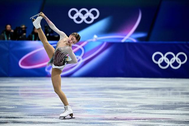 Austria's Olga Mikutina competes in the figure skating women's single skating short program during the Milano Cortina 2026 Winter Olympic Games at Milano Ice Skating Arena in Milan on February 17, 2026. (Photo by JULIEN DE ROSA / AFP)