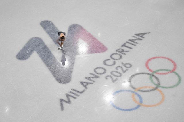 Austria's Olga Mikutina competes in the figure skating women's single skating short program during the Milano Cortina 2026 Winter Olympic Games at Milano Ice Skating Arena in Milan on February 17, 2026. (Photo by Antonin THUILLIER / AFP)