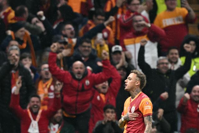 Galatasaray's Dutch forward #77 Noa Lang celebrates scoring his team's fourth goal during the UEFA Champions League, knockout round play-off 1st leg, football match between Galatasaray SK and Juventus FC at the Rams Park in Istanbul on February 17, 2026. (Photo by Ozan KOSE / AFP)