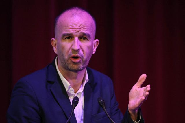 La France Insoumise - Nouveau Front Populaire's MP Manuel Bompard speaks during a meeting of La France Insoumise (LFI) party for a popular and anti-racist Mulhouse as part of the campaign for France's upcoming municipal elections, in Mulhouse, eastern France on February 17, 2026. (Photo by SEBASTIEN BOZON / AFP)