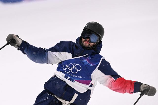 France's Timothe Sivignon reacts after competing in the freestyle skiing men's freeski big air final run 3 during the Milano Cortina 2026 Winter Olympic Games at Livigno Snow Park, in Livigno (Valtellina), on February 17, 2026. (Photo by Kirill KUDRYAVTSEV / AFP)