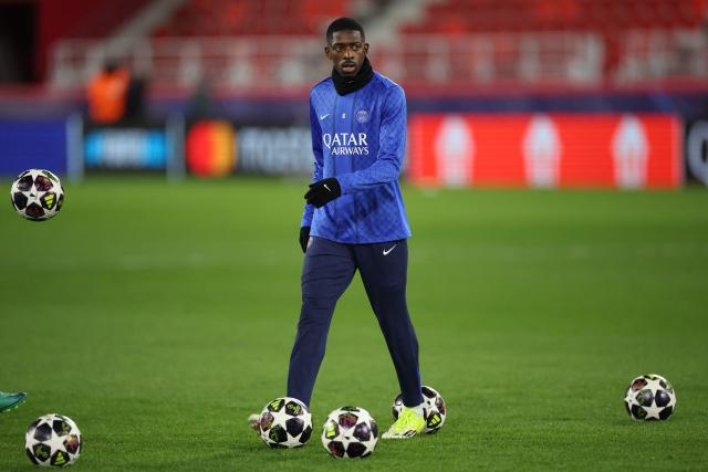 Paris Saint-Germain's French forward #10 Ousmane Dembele warms-up before the start of the UEFA Champions League knockout round play-off first leg football match between AS Monaco and Paris Saint-Germain at Stade Louis II in the Principality of Monaco on February 17, 2026. (Photo by Valery HACHE / AFP)