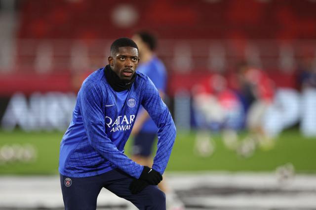 Paris Saint-Germain's French forward #10 Ousmane Dembele looks on during the warm-up before the start of the UEFA Champions League knockout round play-off first leg football match between AS Monaco and Paris Saint-Germain at Stade Louis II in the Principality of Monaco on February 17, 2026. (Photo by Valery HACHE / AFP)