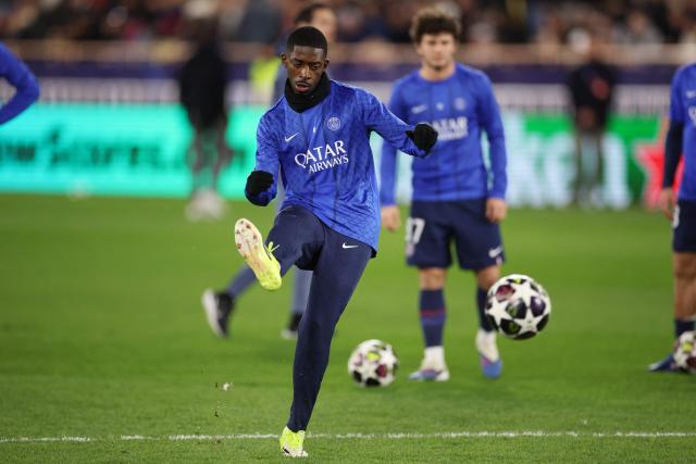 Paris Saint-Germain's French forward #10 Ousmane Dembele warms-up before the start of the UEFA Champions League knockout round play-off first leg football match between AS Monaco and Paris Saint-Germain at Stade Louis II in the Principality of Monaco on February 17, 2026. (Photo by Valery HACHE / AFP)