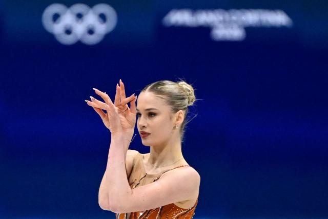 Switzerland's Kimmy Repond competes in the figure skating women's single skating short program during the Milano Cortina 2026 Winter Olympic Games at Milano Ice Skating Arena in Milan on February 17, 2026. (Photo by WANG Zhao / AFP)