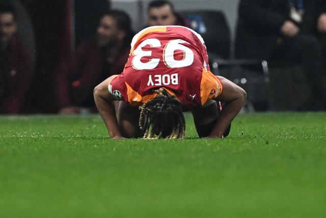 Galatasaray's French defender #93 Sacha Boey celebrates scoring his team's fifth goal during the UEFA Champions League, knockout round play-off 1st leg, football match between Galatasaray SK and Juventus FC at the Rams Park in Istanbul on February 17, 2026. (Photo by YASIN AKGUL / AFP)