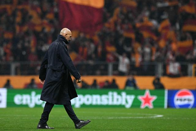 Juventus' Italian coach Luciano Spalletti walks on the pitch after his team lost the UEFA Champions League, knockout round play-off 1st leg, football match between Galatasaray SK and Juventus FC at the Rams Park in Istanbul on February 17, 2026. (Photo by Ozan KOSE / AFP)