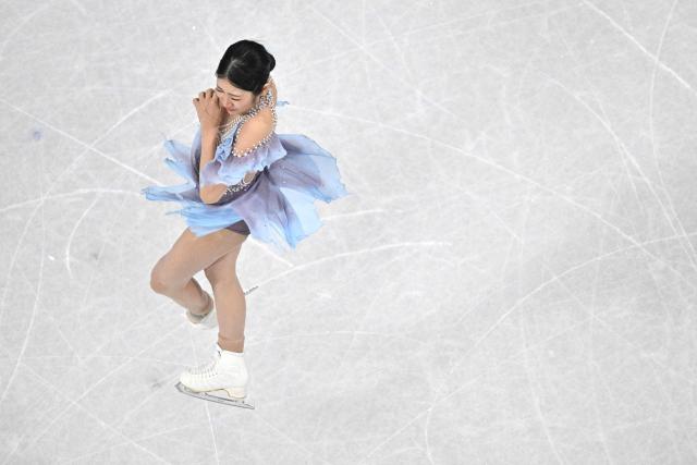 South Korea's Lee Haein competes in the figure skating women's single skating short program during the Milano Cortina 2026 Winter Olympic Games at Milano Ice Skating Arena in Milan on February 17, 2026. (Photo by Antonin THUILLIER / AFP)