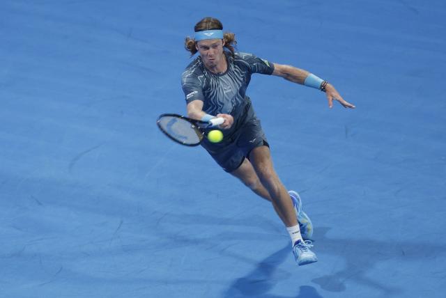 Russia's Andrey Rublev hits a return against Netherlands’ Jesper De Jong during their men’s singles match at the Qatar Open tennis tournament in Doha on February 17, 2026. (Photo by Karim JAAFAR / AFP)