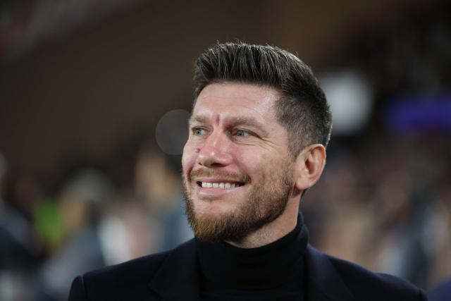 Monaco's Belgian head coach Sebastien Pocognoli looks on before the start of the UEFA Champions League knockout round play-off first leg football match between AS Monaco and Paris Saint-Germain at Stade Louis II in the Principality of Monaco on February 17, 2026. (Photo by Valery HACHE / AFP)
