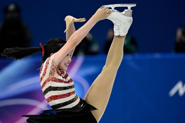 Japan's Ami Nakai competes in the figure skating women's single skating short program during the Milano Cortina 2026 Winter Olympic Games at Milano Ice Skating Arena in Milan on February 17, 2026. (Photo by WANG Zhao / AFP)