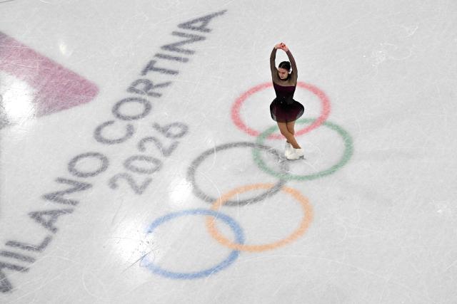 Italy's Lara Naki Gutmann competes in the figure skating women's single skating short program during the Milano Cortina 2026 Winter Olympic Games at Milano Ice Skating Arena in Milan on February 17, 2026. (Photo by Antonin THUILLIER / AFP)