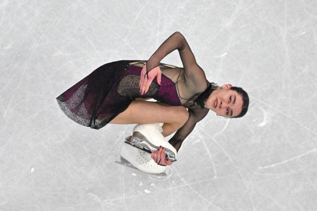 Italy's Lara Naki Gutmann competes in the figure skating women's single skating short program during the Milano Cortina 2026 Winter Olympic Games at Milano Ice Skating Arena in Milan on February 17, 2026. (Photo by Antonin THUILLIER / AFP)