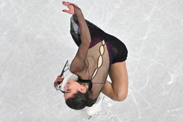 Italy's Lara Naki Gutmann competes in the figure skating women's single skating short program during the Milano Cortina 2026 Winter Olympic Games at Milano Ice Skating Arena in Milan on February 17, 2026. (Photo by Antonin THUILLIER / AFP)