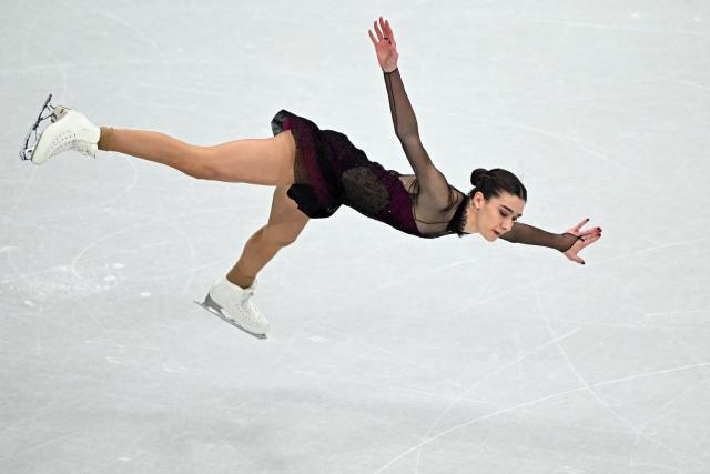 Italy's Lara Naki Gutmann competes in the figure skating women's single skating short program during the Milano Cortina 2026 Winter Olympic Games at Milano Ice Skating Arena in Milan on February 17, 2026. (Photo by Gabriel BOUYS / AFP)