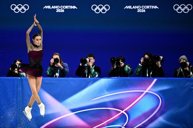 Italy's Lara Naki Gutmann competes in the figure skating women's single skating short program during the Milano Cortina 2026 Winter Olympic Games at Milano Ice Skating Arena in Milan on February 17, 2026. (Photo by JULIEN DE ROSA / AFP)