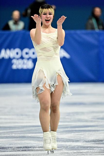 USA's Alysa Liu reacts after competing in the figure skating women's single skating short program during the Milano Cortina 2026 Winter Olympic Games at Milano Ice Skating Arena in Milan on February 17, 2026. (Photo by JULIEN DE ROSA / AFP)