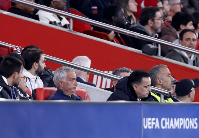 SL Benfica's Portuguese head coach Jose Mourinho reacts in the stands after receiving a red card during the UEFA Champions League knockout round play-off first leg football match between SL Benfica and Real Madrid CF at Estadio da Luz in Lisbon on February 17, 2026. (Photo by FILIPE AMORIM / AFP)