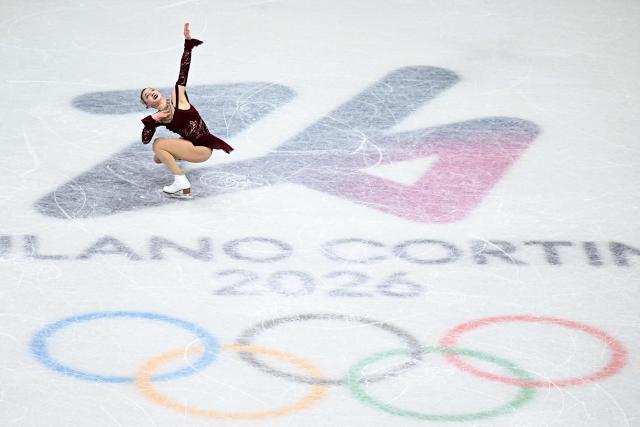 USA's Amber Glenn competes in the figure skating women's single skating short program during the Milano Cortina 2026 Winter Olympic Games at Milano Ice Skating Arena in Milan on February 17, 2026. (Photo by Gabriel BOUYS / AFP)