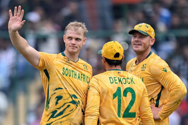 South Africa's Corbin Bosch (L) celebrates with teammates after taking the wicket of UAE's Sohaib Khan during the 2026 ICC Men's T20 Cricket World Cup group stage match between South Africa and United Arab Emirates at the Arun Jaitley Stadium in New Delhi on February 18, 2026. (Photo by Arun SANKAR / AFP)