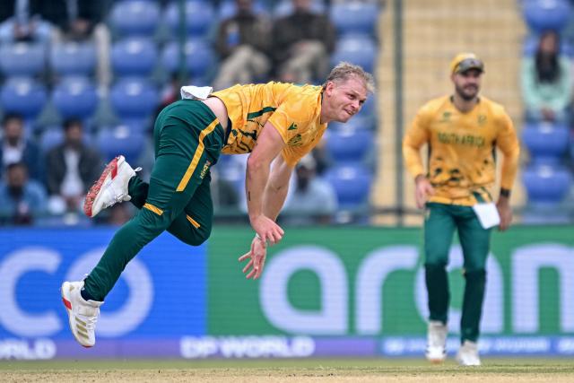 South Africa's Corbin Bosch delivers a ball during the 2026 ICC Men's T20 Cricket World Cup group stage match between South Africa and United Arab Emirates at the Arun Jaitley Stadium in New Delhi on February 18, 2026. (Photo by Arun SANKAR / AFP)