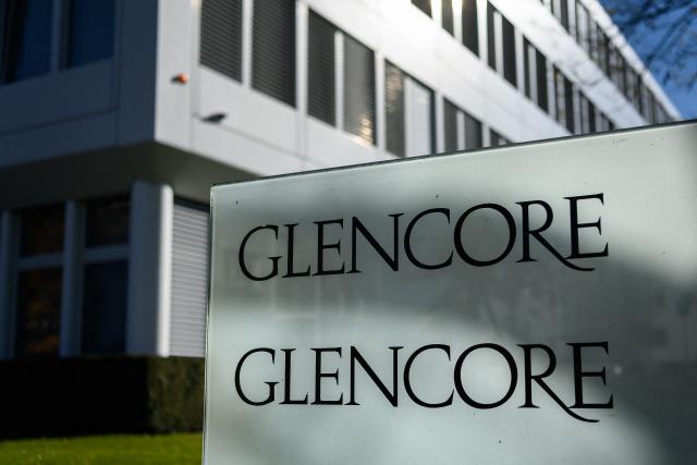 (FILES) A picture taken on November 13, 2020 shows the headquarters of Swiss commodity trading giant Glencore in Baar, central Switzerland, ahead of November 29, 2020 nationwide vote on a people's initiative to impose due diligence rules on Swiss-based firms active abroad. Swiss resources giant Glencore said on February 18, 2026 that it returned to profit last year and insisted its "standalone investment case is strong", two weeks after dropping a merger plan with British-Australian miner Rio Tinto. (Photo by Fabrice COFFRINI / AFP)