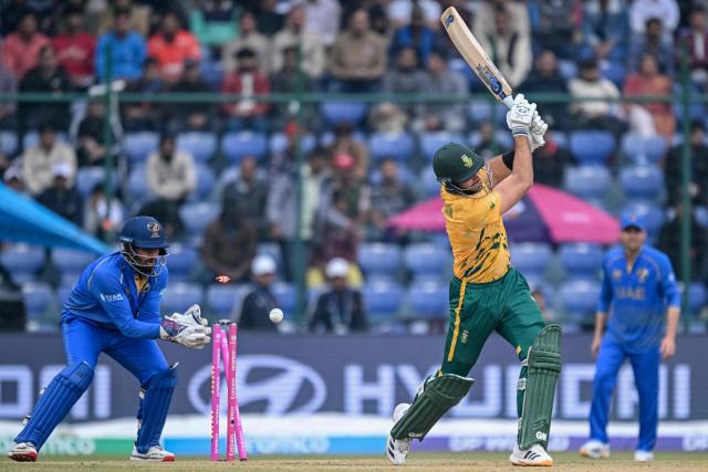 South Africa's captain Aiden Markram (R) is clean bowled by UAE's Haider Ali during the 2026 ICC Men's T20 Cricket World Cup group stage match between South Africa and United Arab Emirates at the Arun Jaitley Stadium in New Delhi on February 18, 2026. (Photo by Arun SANKAR / AFP)