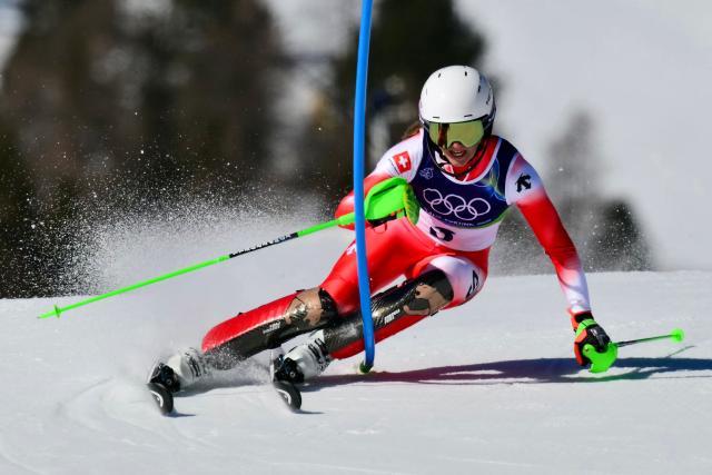 Switzerland's Camille Rast competes in the first run of the women's slalom event during the Milano Cortina 2026 Winter Olympic Games at the Tofane Alpine Skiing Centre in Cortina d’Ampezzo on February 18, 2026. (Photo by Stefano RELLANDINI / AFP)