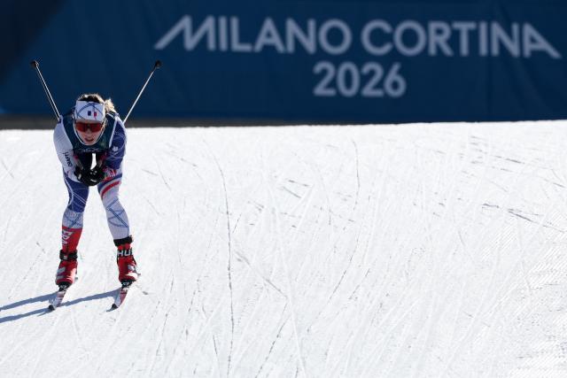 France's Melissa Gal competes during the women's team cross country free sprint qualification event of the Milano Cortina 2026 Winter Olympic Games at Tesero Cross-Country Skiing Stadium in Lago di Tesero (Val di Fiemme), on February 18, 2026. (Photo by Anne-Christine POUJOULAT / AFP)