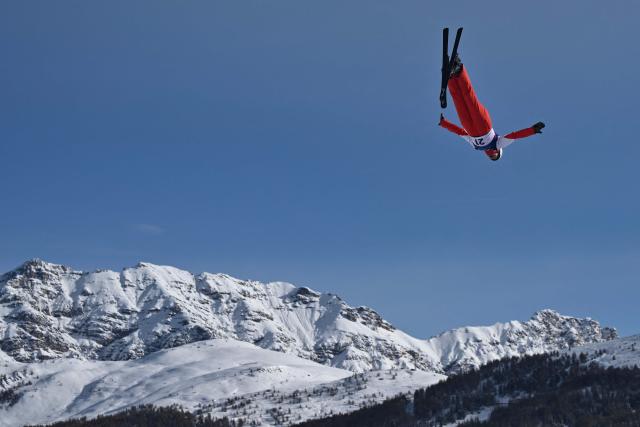 Switzerland's Lina Kozomara competes in the freestyle skiing women's aerials qualification 1 during the Milano Cortina 2026 Winter Olympic Games at Livigno Aerials & Moguls Park, in Livigno (Valtellina), on February 18, 2026. (Photo by Jeff PACHOUD / AFP)