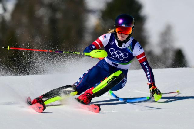 USA's Mikaela Shiffrin competes in the first run of the women's slalom event during the Milano Cortina 2026 Winter Olympic Games at the Tofane Alpine Skiing Centre in Cortina d’Ampezzo on February 18, 2026. (Photo by Stefano RELLANDINI / AFP)