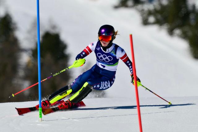 USA's Mikaela Shiffrin competes in the first run of the women's slalom event during the Milano Cortina 2026 Winter Olympic Games at the Tofane Alpine Skiing Centre in Cortina d’Ampezzo on February 18, 2026. (Photo by Stefano RELLANDINI / AFP)