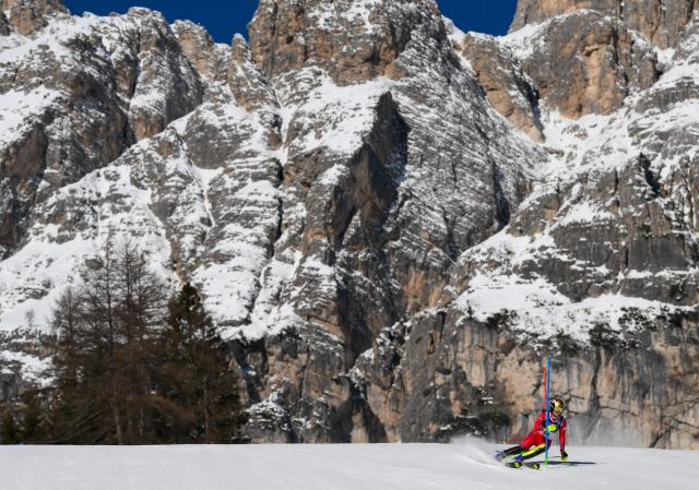 Austria's Katharina Huber competes in the first run of the women's slalom event during the Milano Cortina 2026 Winter Olympic Games at the Tofane Alpine Skiing Centre in Cortina d’Ampezzo on February 18, 2026. (Photo by Marco BERTORELLO / AFP)