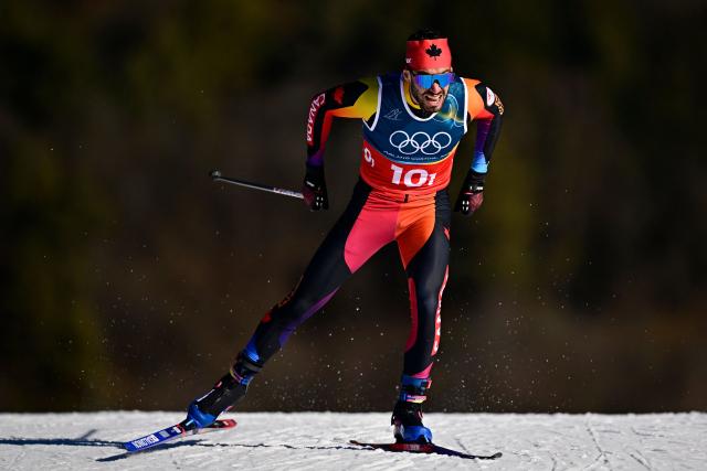 Canada's Antoine Cyr competes during the men's team cross country free sprint qualification event of the Milano Cortina 2026 Winter Olympic Games at Tesero Cross-Country Skiing Stadium in Lago di Tesero (Val di Fiemme), on February 18, 2026. (Photo by Tobias SCHWARZ / AFP)