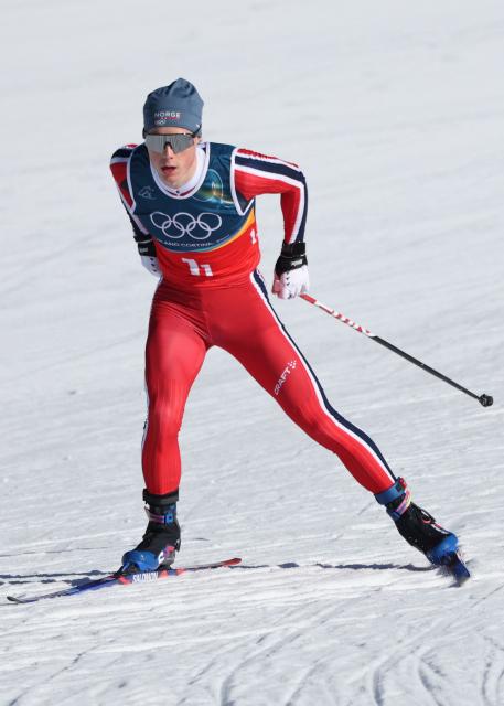 Norway's Einar Hedegart competes during the men's team cross country free sprint qualification event of the Milano Cortina 2026 Winter Olympic Games at Tesero Cross-Country Skiing Stadium in Lago di Tesero (Val di Fiemme), on February 18, 2026. (Photo by Anne-Christine POUJOULAT / AFP)