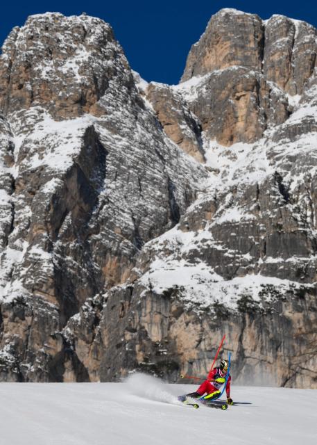 Austria's Katharina Huber competes in the first run of the women's slalom event during the Milano Cortina 2026 Winter Olympic Games at the Tofane Alpine Skiing Centre in Cortina d’Ampezzo on February 18, 2026. (Photo by Marco BERTORELLO / AFP)