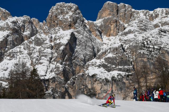 Austria's Katharina Huber competes in the first run of the women's slalom event during the Milano Cortina 2026 Winter Olympic Games at the Tofane Alpine Skiing Centre in Cortina d’Ampezzo on February 18, 2026. (Photo by Marco BERTORELLO / AFP)