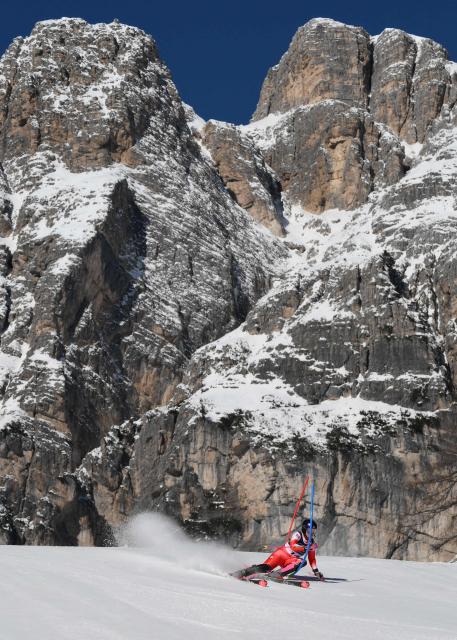 Switzerland's Melanie Meillard competes in the first run of the women's slalom event during the Milano Cortina 2026 Winter Olympic Games at the Tofane Alpine Skiing Centre in Cortina d’Ampezzo on February 18, 2026. (Photo by Marco BERTORELLO / AFP)