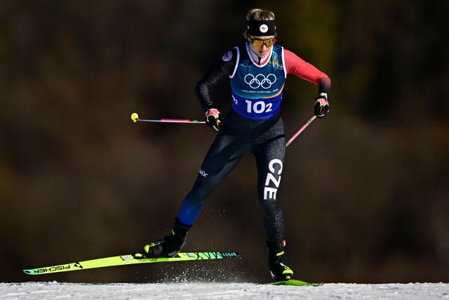Czech Republic's Katerina Janatova competes during the women's team cross country free sprint qualification event of the Milano Cortina 2026 Winter Olympic Games at Tesero Cross-Country Skiing Stadium in Lago di Tesero (Val di Fiemme), on February 18, 2026. (Photo by Tobias SCHWARZ / AFP)