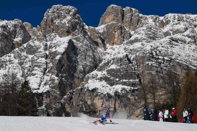 France's Caitlin McFarlane competes in the first run of the women's slalom event during the Milano Cortina 2026 Winter Olympic Games at the Tofane Alpine Skiing Centre in Cortina d’Ampezzo on February 18, 2026. (Photo by Marco BERTORELLO / AFP)