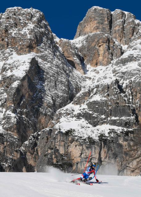 France's Caitlin McFarlane competes in the first run of the women's slalom event during the Milano Cortina 2026 Winter Olympic Games at the Tofane Alpine Skiing Centre in Cortina d’Ampezzo on February 18, 2026. (Photo by Marco BERTORELLO / AFP)